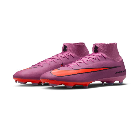Purple soccer cleats with red accents on a white background